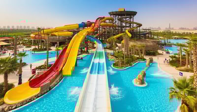 Aerial view of Aquaventure World Dubai with water slides and pools Aerial view of Aquaventure World Dubai with water slides and pools